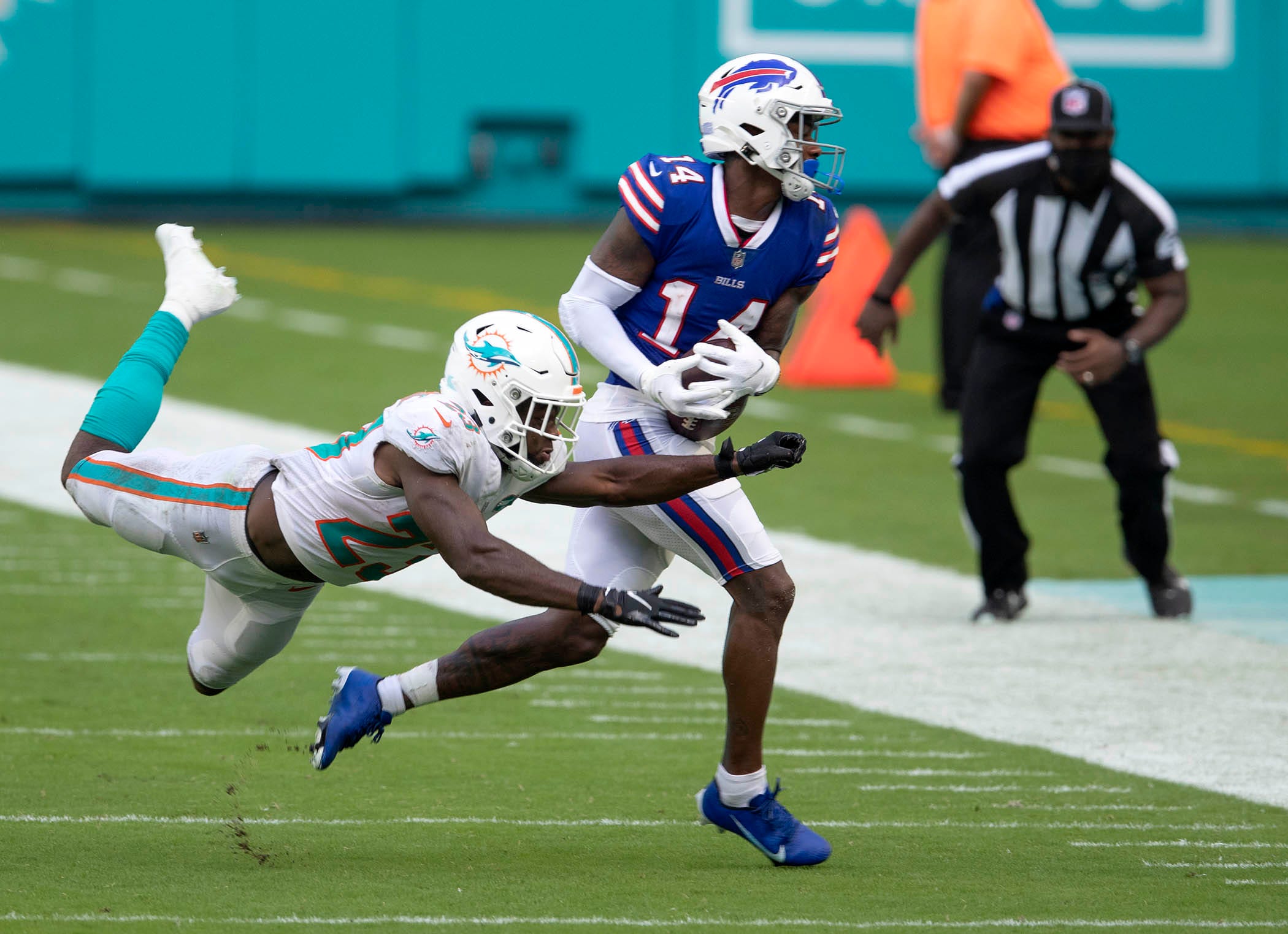 Miami Dolphins' rookie Noah Igbinoghene struggles against Bills