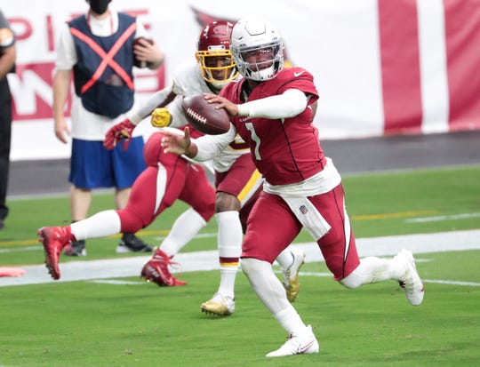 Arizona Cardinals quarterback Kyler Murray (1) scores a touchdown against the Washington Football Team during the first quarter at State Farm Stadium Sept. 20, 2020.