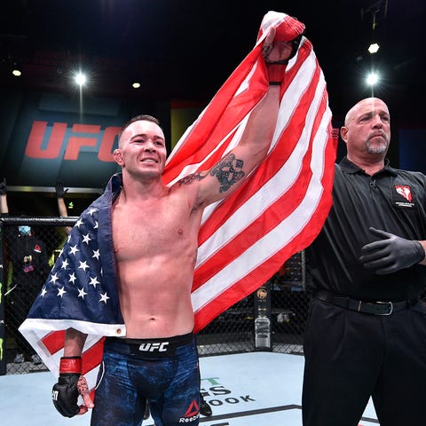 Colby Covington celebrates after his TKO victory o