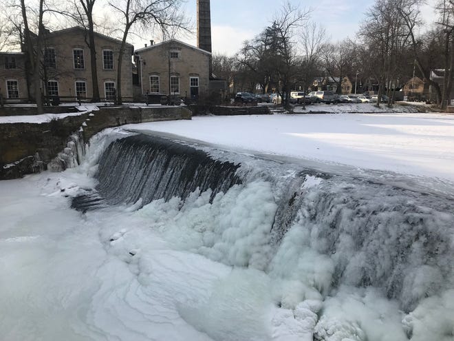Water flowing and frozen over the dam in early January, 2018, when the temperatures were sub-zero.