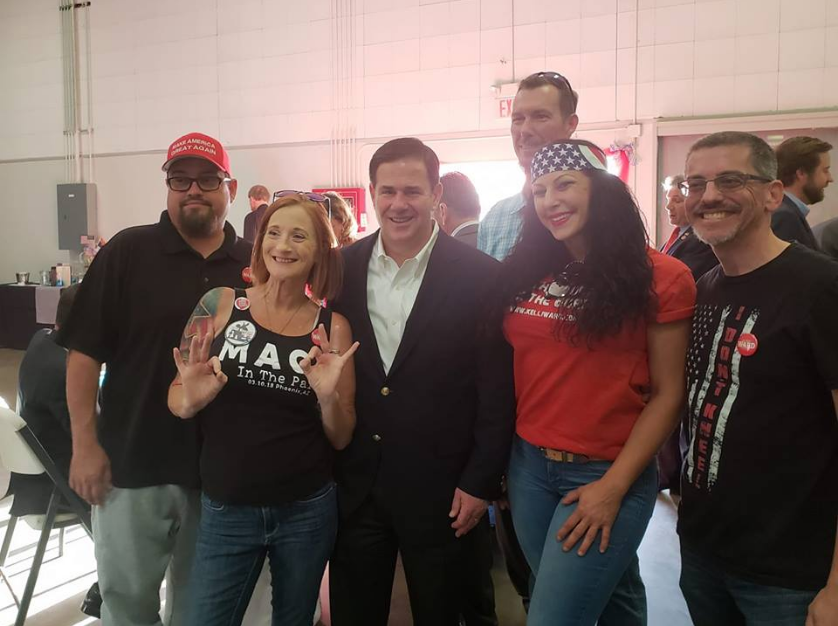A photo posted on the Patriot Movement AZ Facebook page shows members of the Patriot Movement AZ group including Lesa Antone and Jennifer Harrison posing with Gov. Doug Ducey.