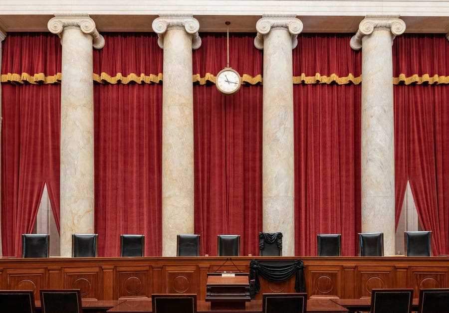 The Supreme Court bench draped for the death of Justice Ruth Bader Ginsburg on Sept. 19, 2020.