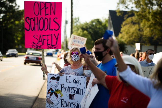 People attend a rally in support of reopening Cumberland County schools on Wednesday, Sept. 23, 2020. 