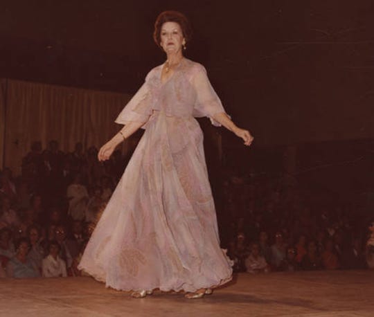 Madera Spencer on the runway in 1978 during a cystic fibrosis fashion show at the civic center in Montgomery, wearing a dress designed by Kelli Thompson.