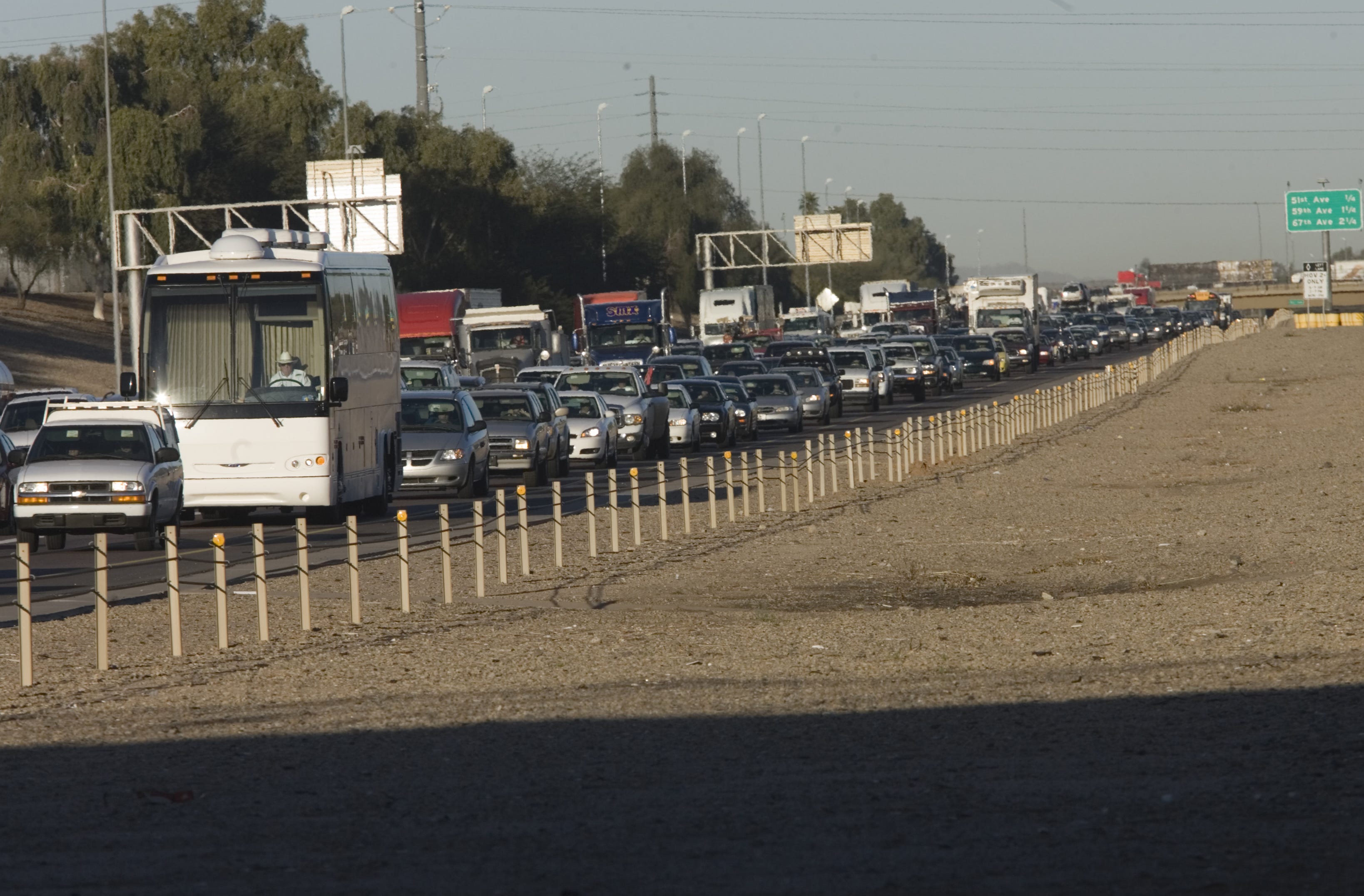 Heavy traffic on Phoenix freeways contributes to greenhouse gas emissions.