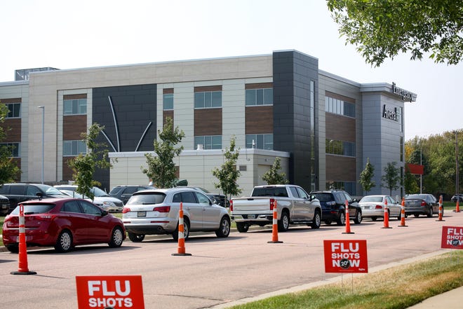 People wait in their cars in a long line for COVID-19 testing on Wednesday, September 23, at the Avera Family Health Center in Sioux Falls.