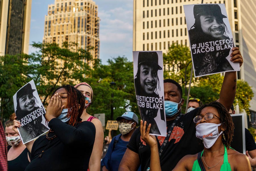 Protesters demand an accounting in the Jacob Blake case outside a police precinct Aug. 24, 2020, in Minneapolis.