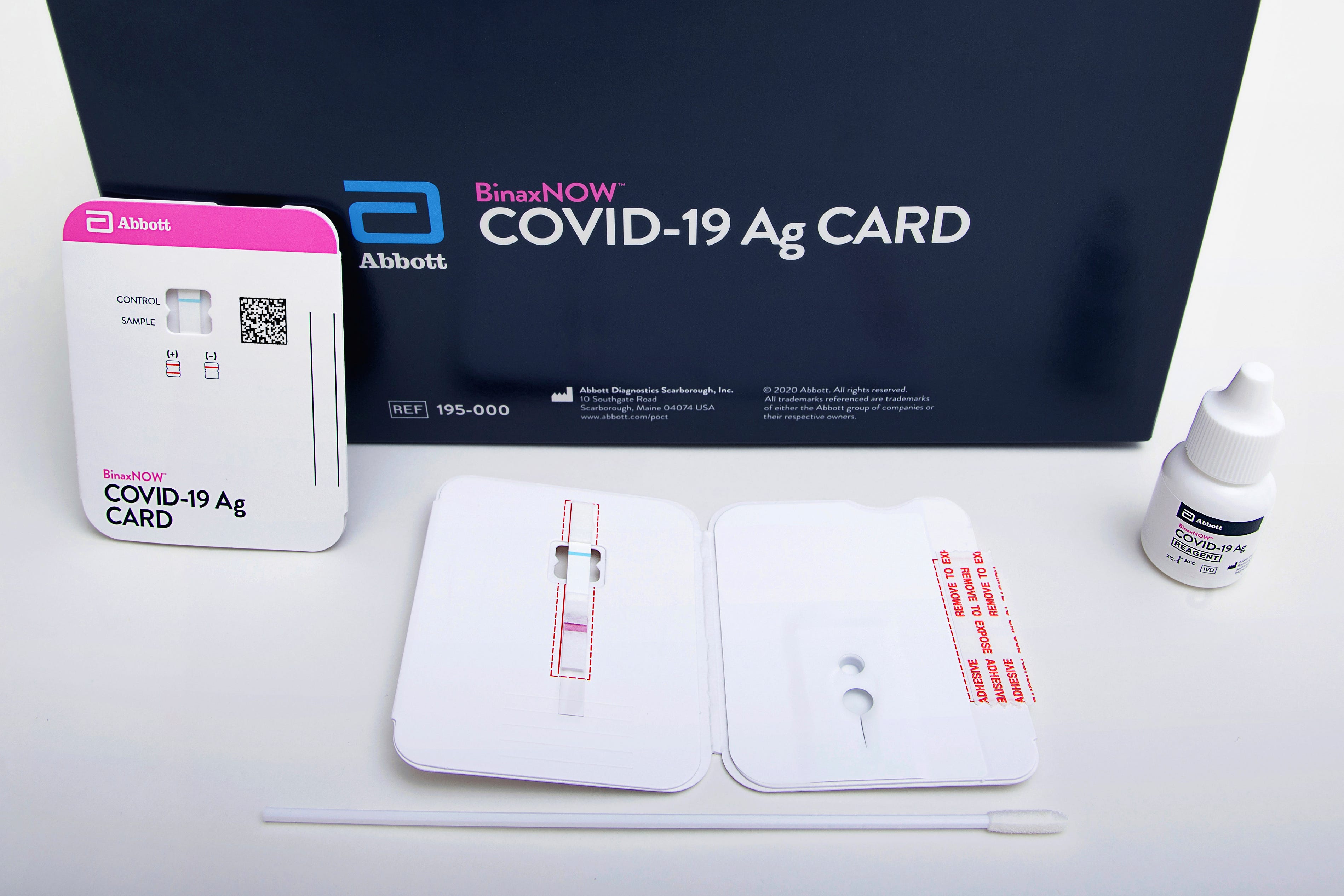 This image provided by Abbott Laboratories in August 2020 shows the company's BinaxNOW rapid COVID-19 nasal swab test. The Food and Drug Administration on Wednesday, Aug. 26, 2020, authorized BinaxNOW, the first rapid coronavirus test that doesn’t need any special computer equipment to get results.  (Abbott Laboratories via AP) ORG XMIT: NY552