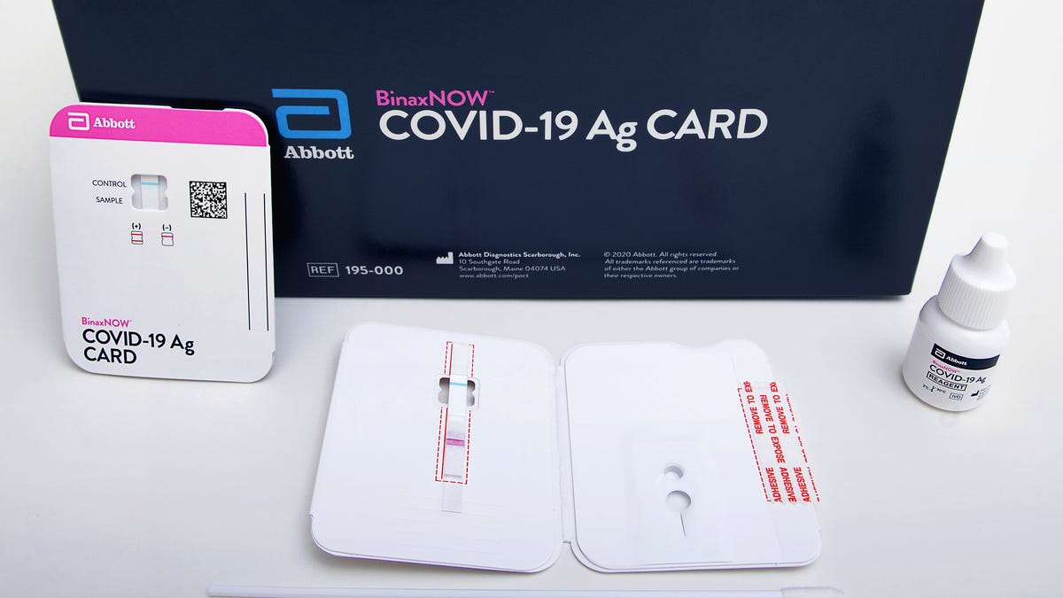 This image provided by Abbott Laboratories in August 2020 shows the company's BinaxNOW rapid COVID-19 nasal swab test. The Food and Drug Administration on Wednesday, Aug. 26, 2020, authorized BinaxNOW, the first rapid coronavirus test that doesn't need any special computer equipment to get results.  (Abbott Laboratories via AP) ORG XMIT: NY552