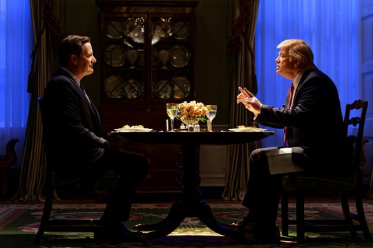 FBI Director James Comey (Jeff Daniels), left, and President Donald Trump (Brendan Gleeson) meet for the famous 'loyalty dinner' in 'The Comey Rule,' a Showtime miniseries.