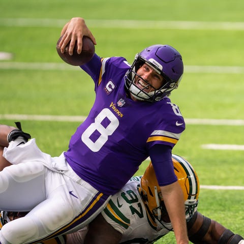 Minnesota Vikings quarterback Kirk Cousins (8) is 