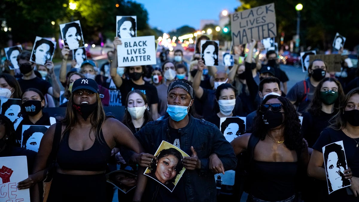 Demonstrators march along Constitution Avenue in protest following a Kentucky grand jury decision in the Breonna Taylor case on Sept. 23, 2020 in Washington, DC.