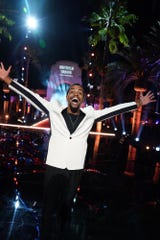 Spoken-word poet Brandon Leake celebrates his 'America's Got Talent' victory Wednesday outdoors at Universal Studios Hollywood.