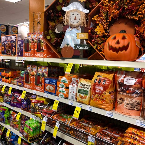 Halloween candy and decorations are displayed at a