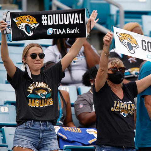 Jacksonville Jaguars fans cheer during the second 