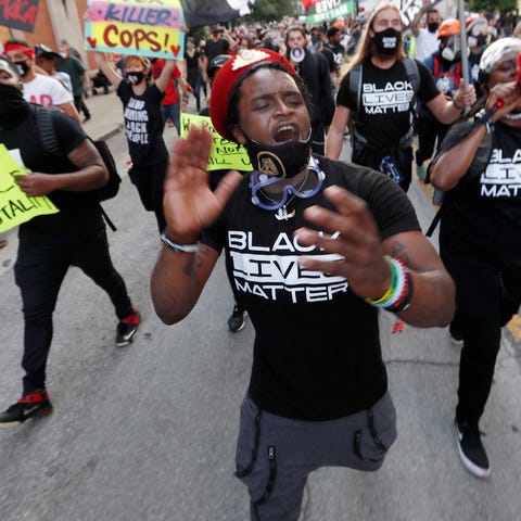 Protesters marched down Guthrie towards Second Str