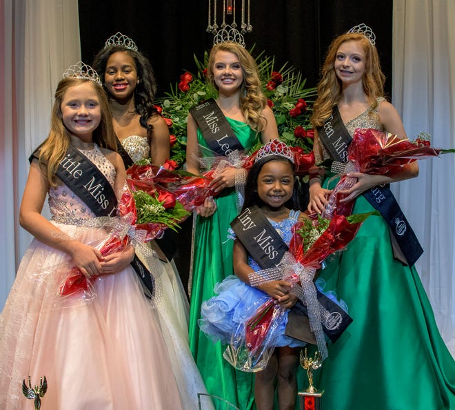 From left, Shaylin Shumate (Little Miss), Caliza O’Bryan (Junior Miss), Riley McDowell (Miss), A’Zyrani Taylor (Tiny Miss) and Kierstyn Riley (Teen Miss) pose at the 34th Annual Miss Leesburg Scholarship Pageant Leesburg High School in Leesburg on Saturday, Sept. 26, 2020. [PAUL RYAN / CORRESPONDENT]