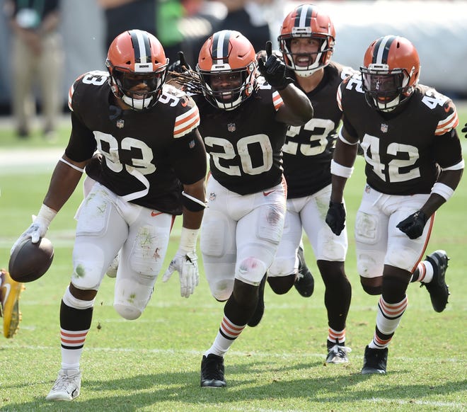 Week 3: The Cleveland Browns' B.J. Goodson (93), Tavierre Thomas (20), Andrew Sendejo (23) and Karl Joseph (42) celebrate after Goodson intercepted a pass against the Washington Football Team at FirstEnergy Stadium.