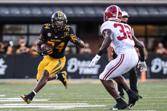 Missouri’s Larry Rountree (34) carries the ball during Saturday's season opener against Alabama at Faurot Field. Rountree gained 67 yards and appears primed for a big senior season.