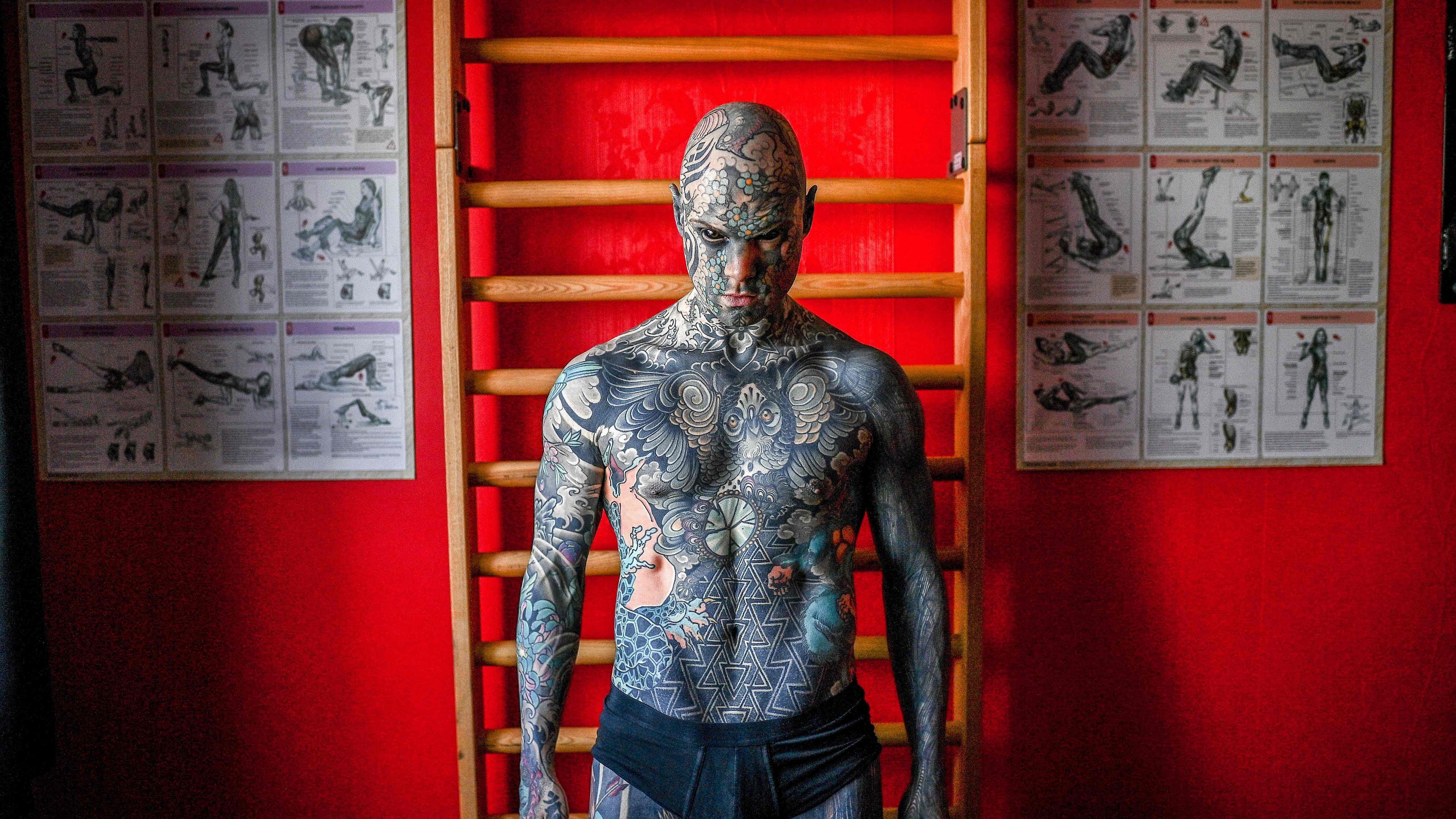 Teacher says he's barred from teaching kindergarten because of tattoos Teacher says he's barred from teaching kindergarten because of tattoos