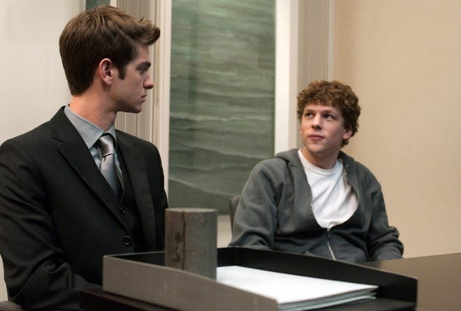 Andrew Garfield, left, plays Eduardo Saverin, the chief financial officer (CFO) of Facebook.