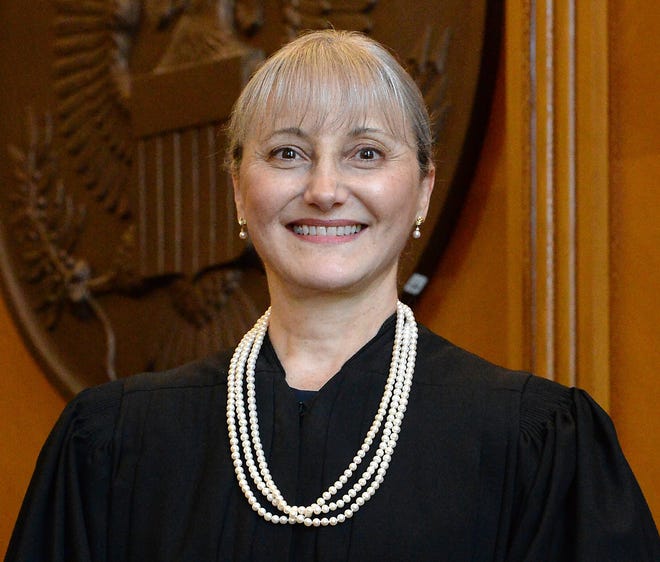 U.S. District Judge Susan Paradise Baxter sentenced the former chief pharmacist at the Veterans Affairs Medical Center in Erie to two years of probation.