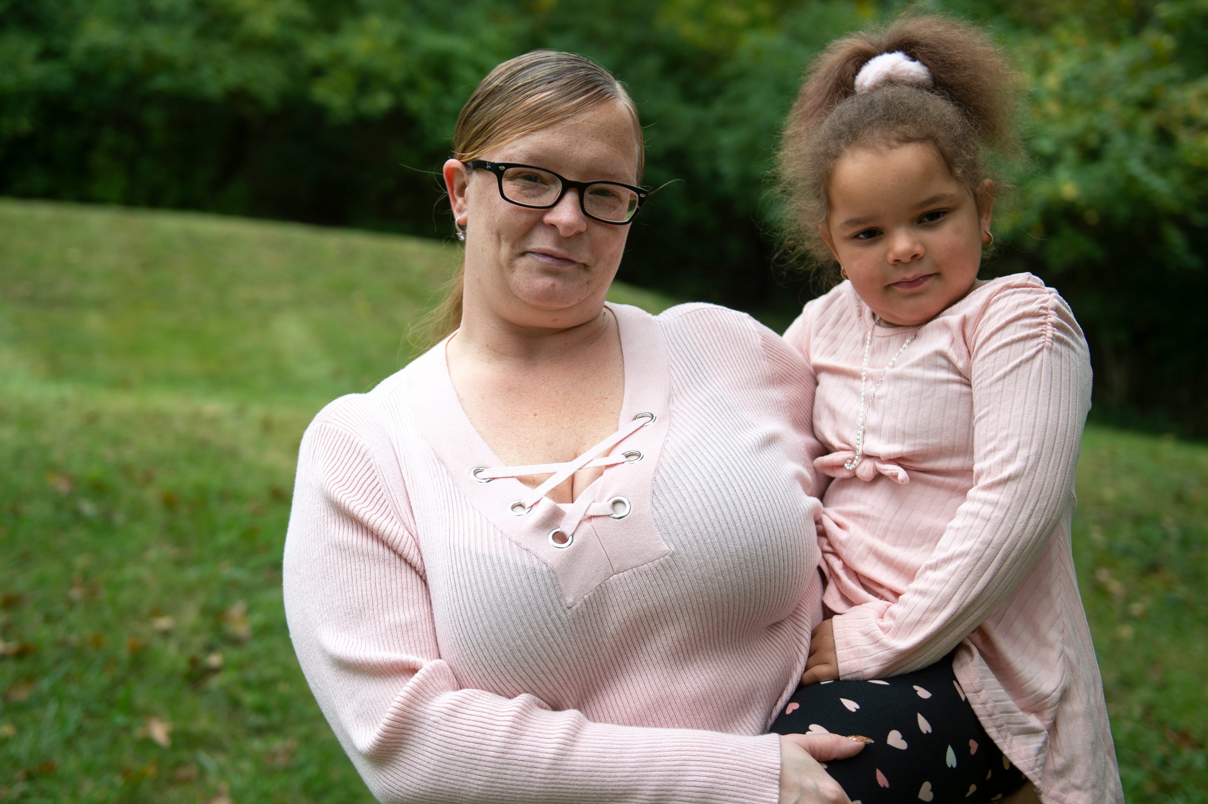 Jacqueline Davis, 34, and her daughter Jarica Hutchingson, 5, pose for a portrait outside Davis’ apartment in Westwood on Tuesday, Sept. 29, 2020. Davis who has worked as a nursing assistant at Bridgetown Nursing and Rehab for about a year has recently started getting her hours cut.