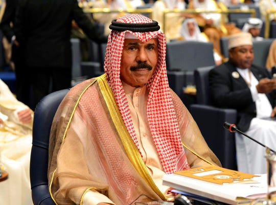 In this Wednesday, March 26, 2014 file photo, Kuwait's Crown Prince Sheik Nawaf Al-Ahmad Al-Jaber Al-Sabah attends the closing session of the 25th Arab Summit in Bayan Palace in Kuwait City.