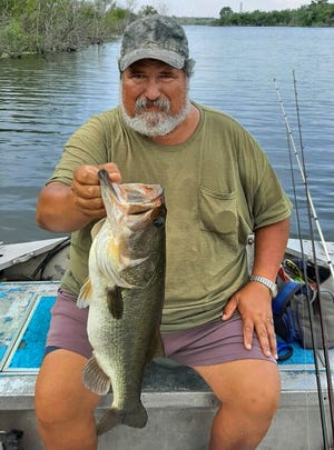 Chris Hertel of Lakeland caught this 6.9-pound largemouth bass while fishing at Tenoroc Fish Management Area recently.