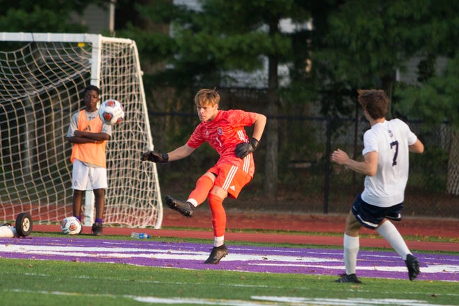 DeSales boys soccer goalkeeper Gabe Weikert, center, hopes to finish his career with a run at another Division II state championship despite the young Stallions' struggles to date. (Photo courtesy Barb Dougherty)
