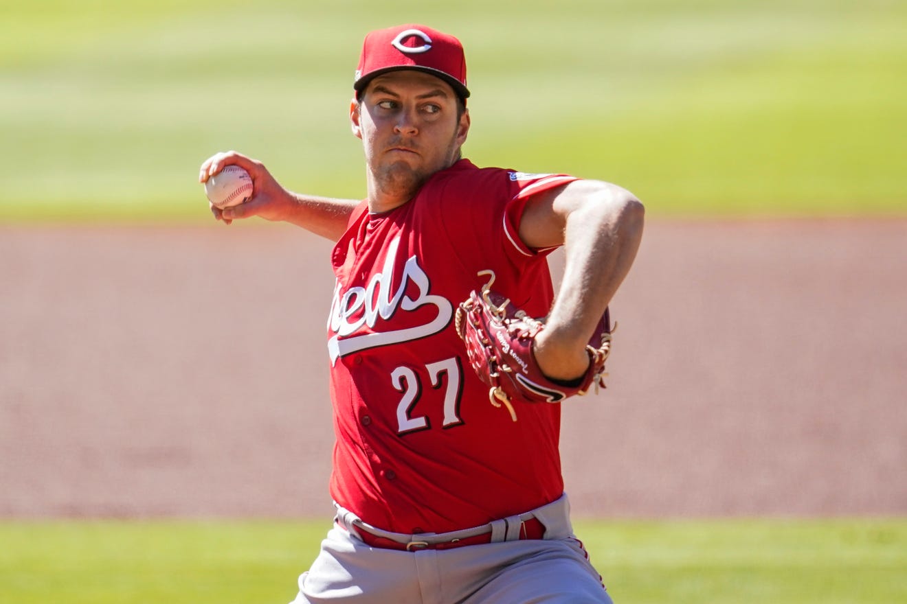 Sep 30, 2020; Cumberland, Georgia, USA; Cincinnati Reds starting pitcher Trevor Bauer (27) pitches against the Atlanta Braves during the first inning at Truist Park. Mandatory Credit: Dale Zanine-USA TODAY Sports