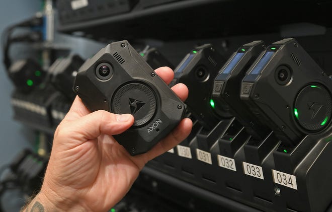 Shown here Thursday are some of the new body cameras that will be worn by officers in the Erie Bureau of Police. On Oct. 1, the department rolled out 140 body cameras and 12 vehicle-mounted units.