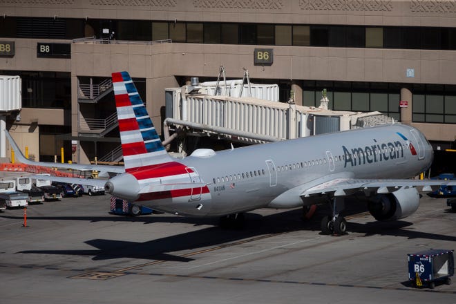 American Airlines planes sit at Terminal 4 at Sky Harbor International Airport in Phoenix on Oct. 1, 2020.