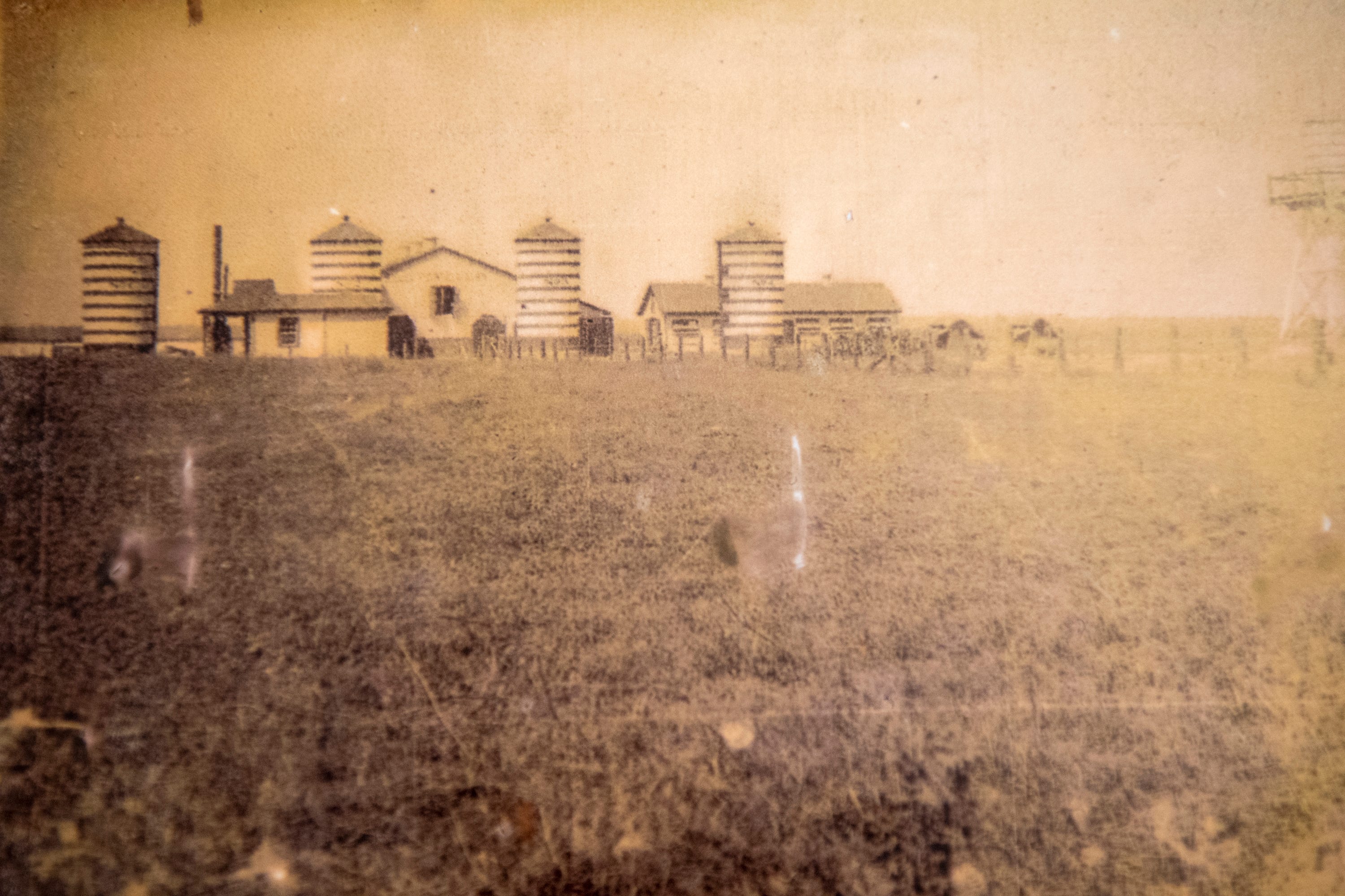 A historical photo shows the Godchaux's Belle Point Dairy, part of the plantation which became Reserve.