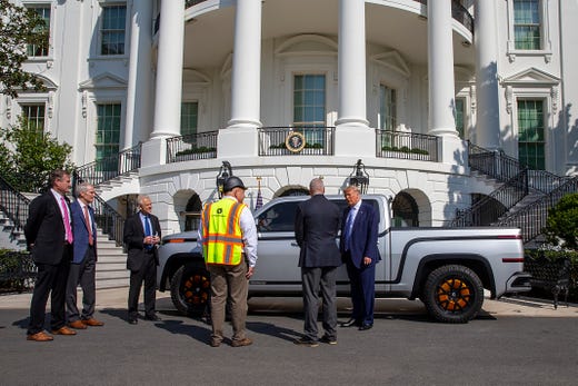 President Donald Trump chats with Steve Burns Lordstown Motors CEO about the new Endurance all-electric pickup truck on the south lawn of the White House on Sept. 28, 2020 in Washington, DC. (Photo by Tasos Katopodis/Getty Images)