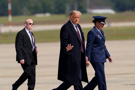President Donald Trump walks from Marine One towards Air Force One at Andrews Air Force Base, Md., Oct. 1, 2020. Trump is heading to New Jersey for a fundraiser at his golf club in Bedminster. 