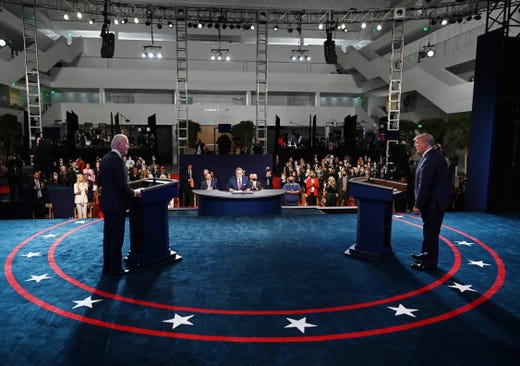 President Donald Trump and Democratic presidential candidate Joe Biden participate in the first presidential debate at the Health Education Campus of Case Western Reserve University on Sept, 29, 2020 in Cleveland, Ohio. 