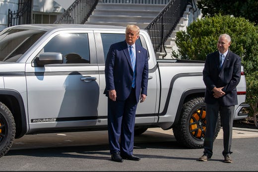 President Donald Trump chats with Steve Burns Lordstown Motors CEO about the new Endurance all-electric pickup truck on the south lawn of the White House on Sept. 28, 2020 in Washington, DC. They bought the old GM Lordstown plant in Ohio to build the Endurance all-electric pickup truck, inside those four wheels are electric motors similar to electric scooters.