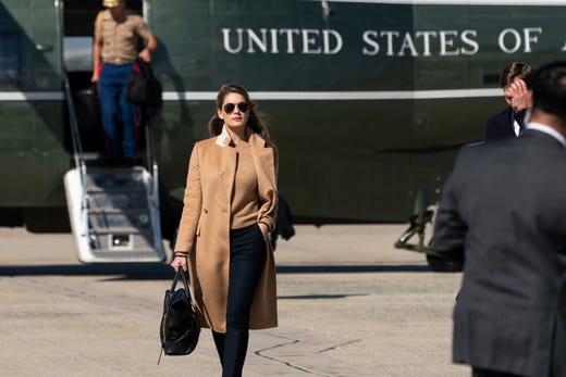 Counselor to the President Hope Hicks walks from Marine One to accompany President Donald Trump aboard Air Force One as he departs Sept. 30, 2020, at Andrews Air Force Base, Md.