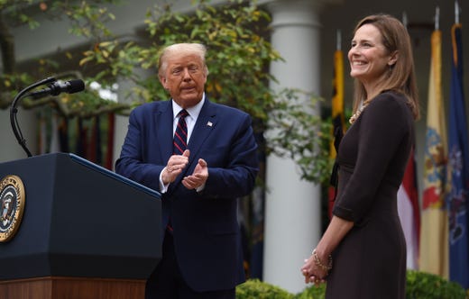 President Donald Trump announces his US Supreme Court nominee, Judge Amy Coney Barrett (R), in the Rose Garden of the White House in Washington, DC on Sept.26, 2020.