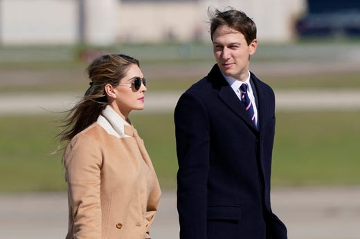 Counselor to the President Hope Hicks, left, and White House adviser Jared Kushner, right, walk towards Air Force One at Andrews Air Force Base, Md., Sept. 30, 2020.