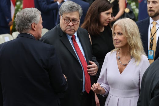 (L-R) White House Chief of Staff Mark Meadows, Attorney General William Barr and Counselor to the President Kellyanne Conway talk in the Rose Garden after President Donald Trump introduced 7th U.S. Circuit Court Judge Amy Coney Barrett, 48, as his nominee to the Supreme Court at the White House Sept. 26, 2020 in Washington, DC. 
