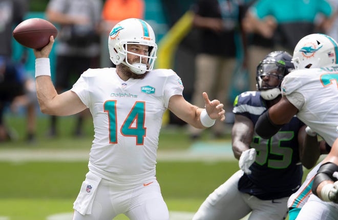 Dolphins quarterback Ryan Fitzpatrick drops back to pass in the first quarter against the Seahawks on Sunday.
