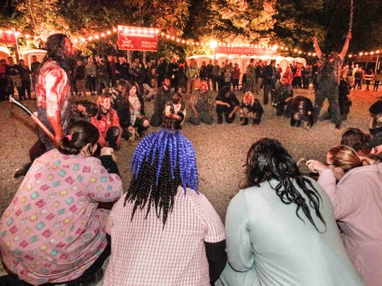 In this 2016 photo, Indy Scream Park actors prepare for a night of scaring guests at the Anderson attraction. This year, Indy Scream Park reduced its visitor capacity to 50%.