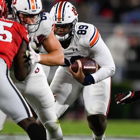 Auburn tight end J.J. Pegues ran the Wildcat forma