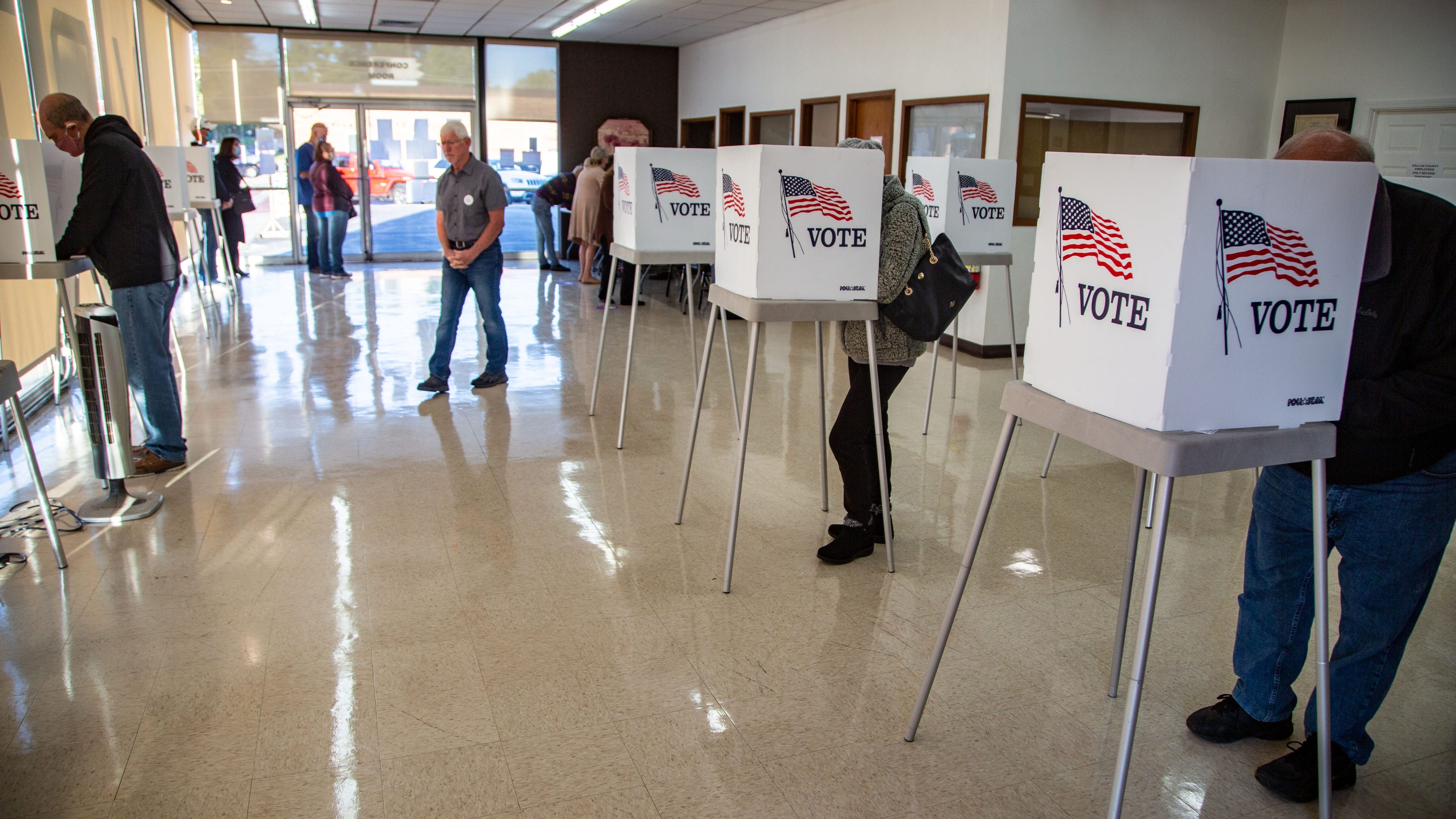 voters filling out their ballots early