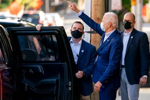 Democratic presidential candidate former Vice President Joe Biden leaves the Queen Theater after a virtual town hall, Saturday, Oct. 3, 2020, in Wilmington, Del.