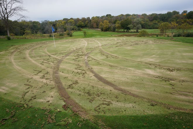 The greens for holes 13 and 14 were damaged by tire tracks at Whitnall Park Golf Course. Police are investigating the damage.