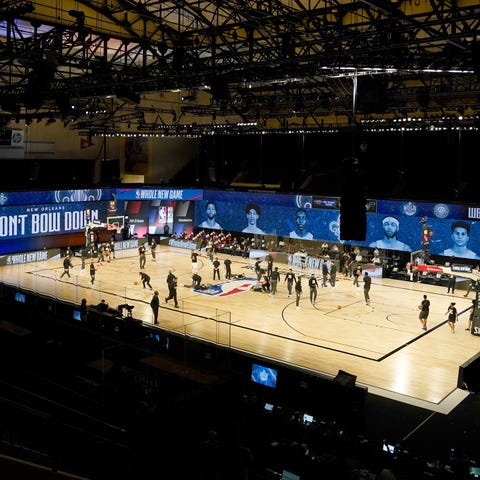 The New Orleans Pelicans and Utah Jazz warm up bef