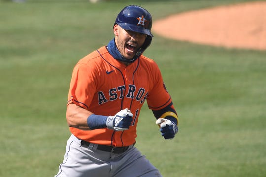 Carlos Correa celebrates his two-run home run in the fourth inning.